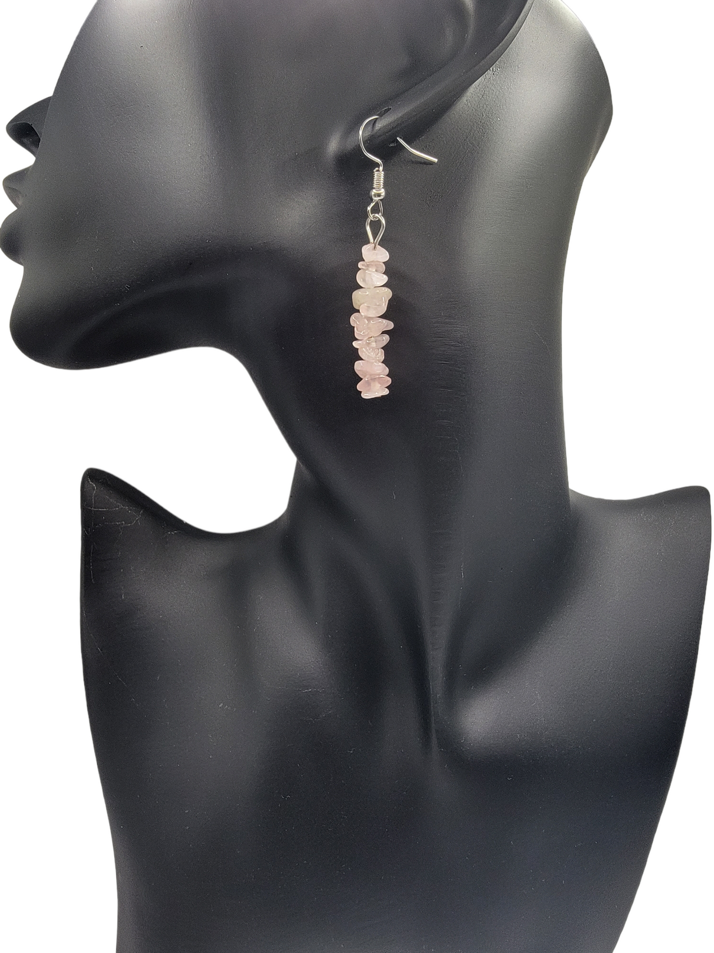 black face silhouette with rose quartz chip dangle earring hanging from ear