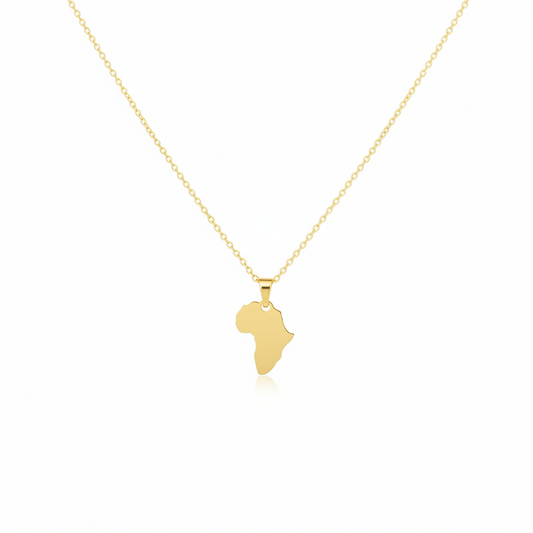 Gold necklace with a pendant shaped like the African continent on a white background