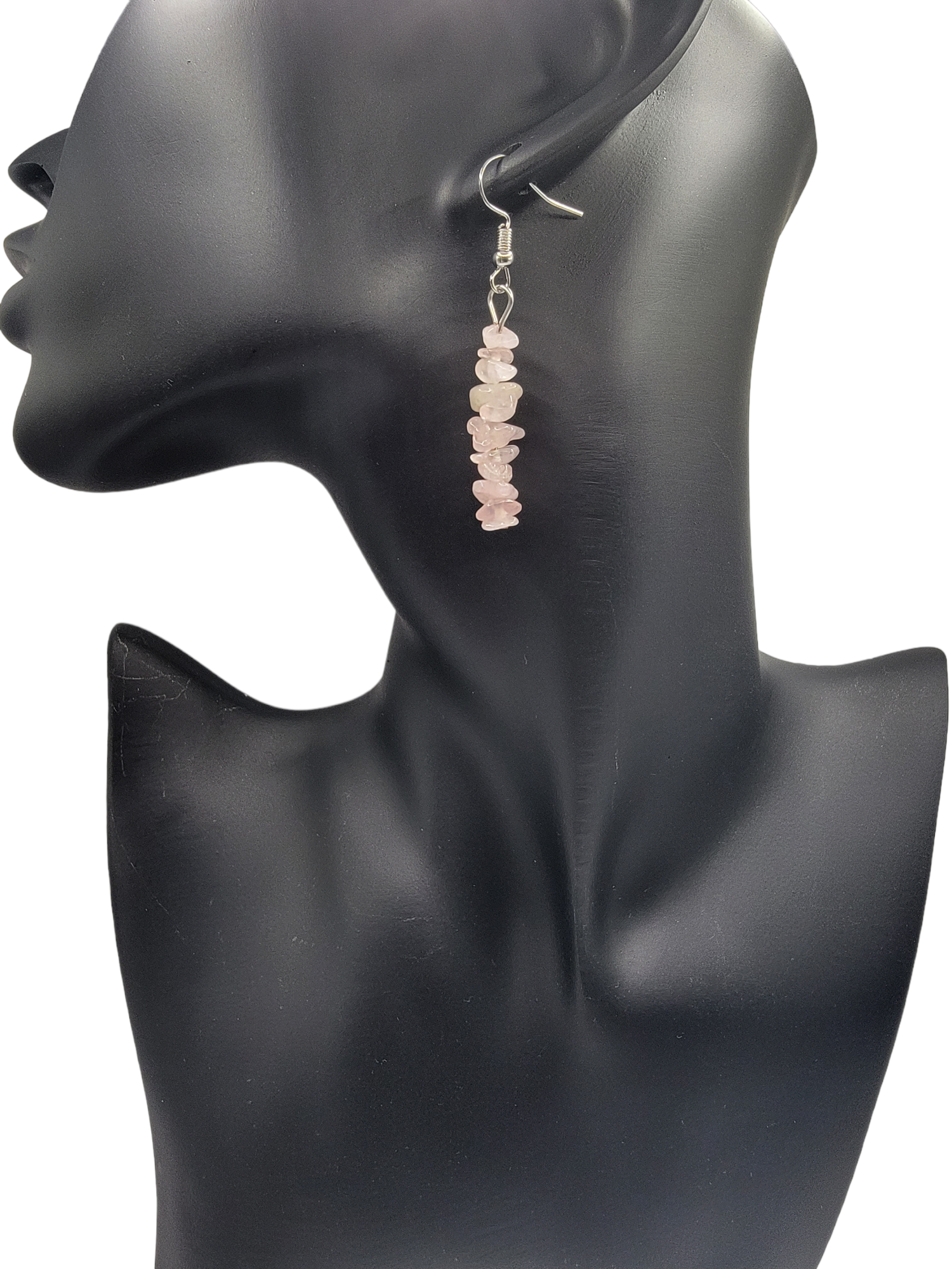black  face silhouette with rose quartz chip dangle earring hanging from ear